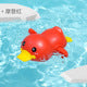 Red wind-up swimming duck water toy