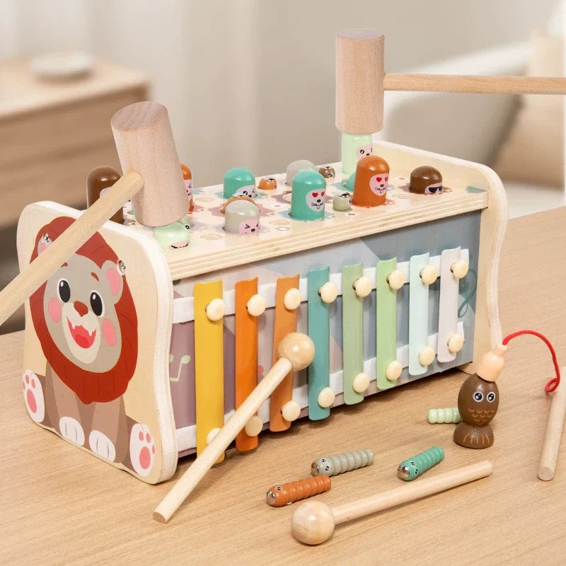 Wooden lion activity box with colorful xylophone, mallets and magnetic fishing pieces