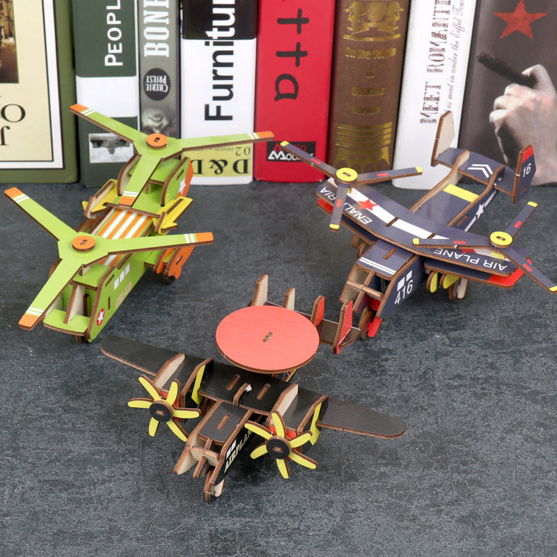 Wooden 3D aircraft puzzle models displayed together