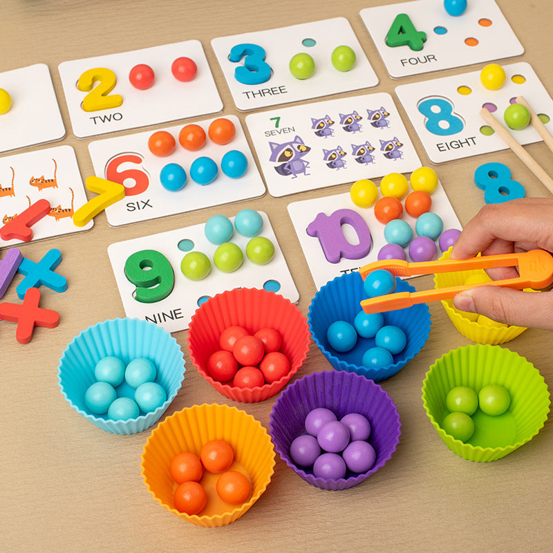 Child using tongs to sort coloured counting beads