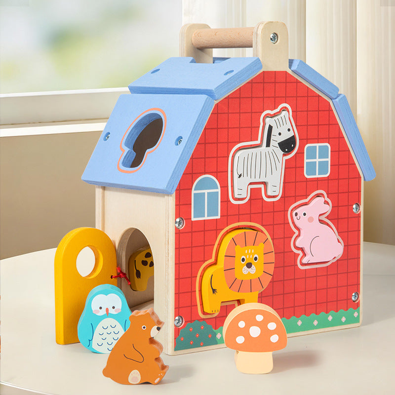 Wooden animal shape sorter house with colourful removable pieces