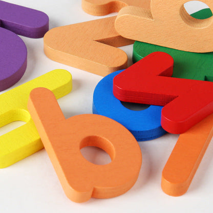 Close-up of colourful wooden alphabet pieces