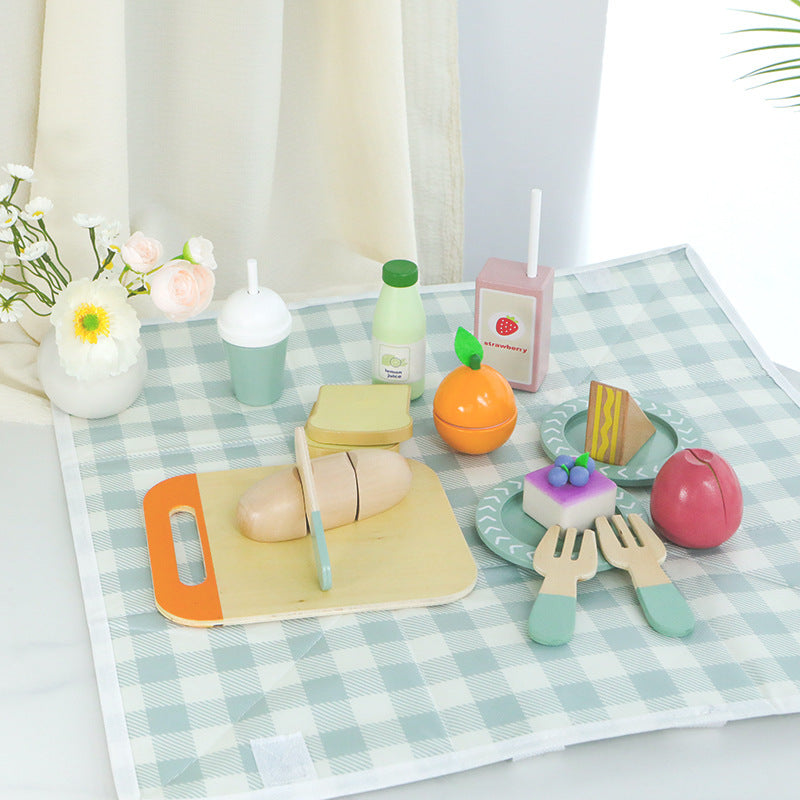 Picnic pretend play set arranged on a checkered picnic mat