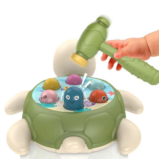 Mini turtle whack-a-mole toy with child-sized hammer