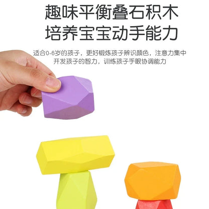 Wooden balancing stone held by hand with stacking example