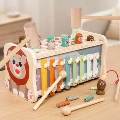 Wooden lion activity box with colorful xylophone, mallets and magnetic fishing pieces